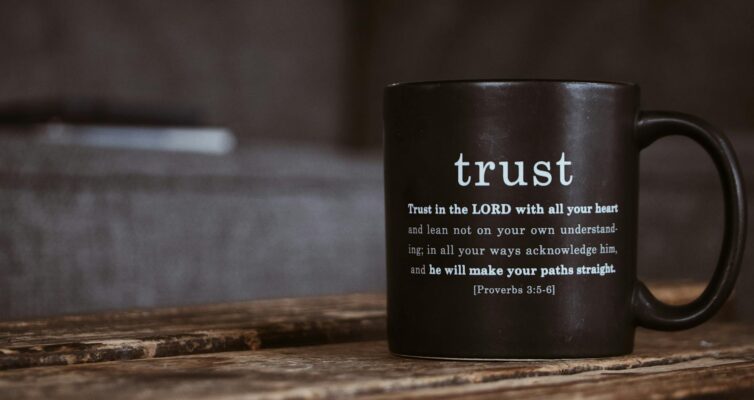 black mug with religious text from holy bible