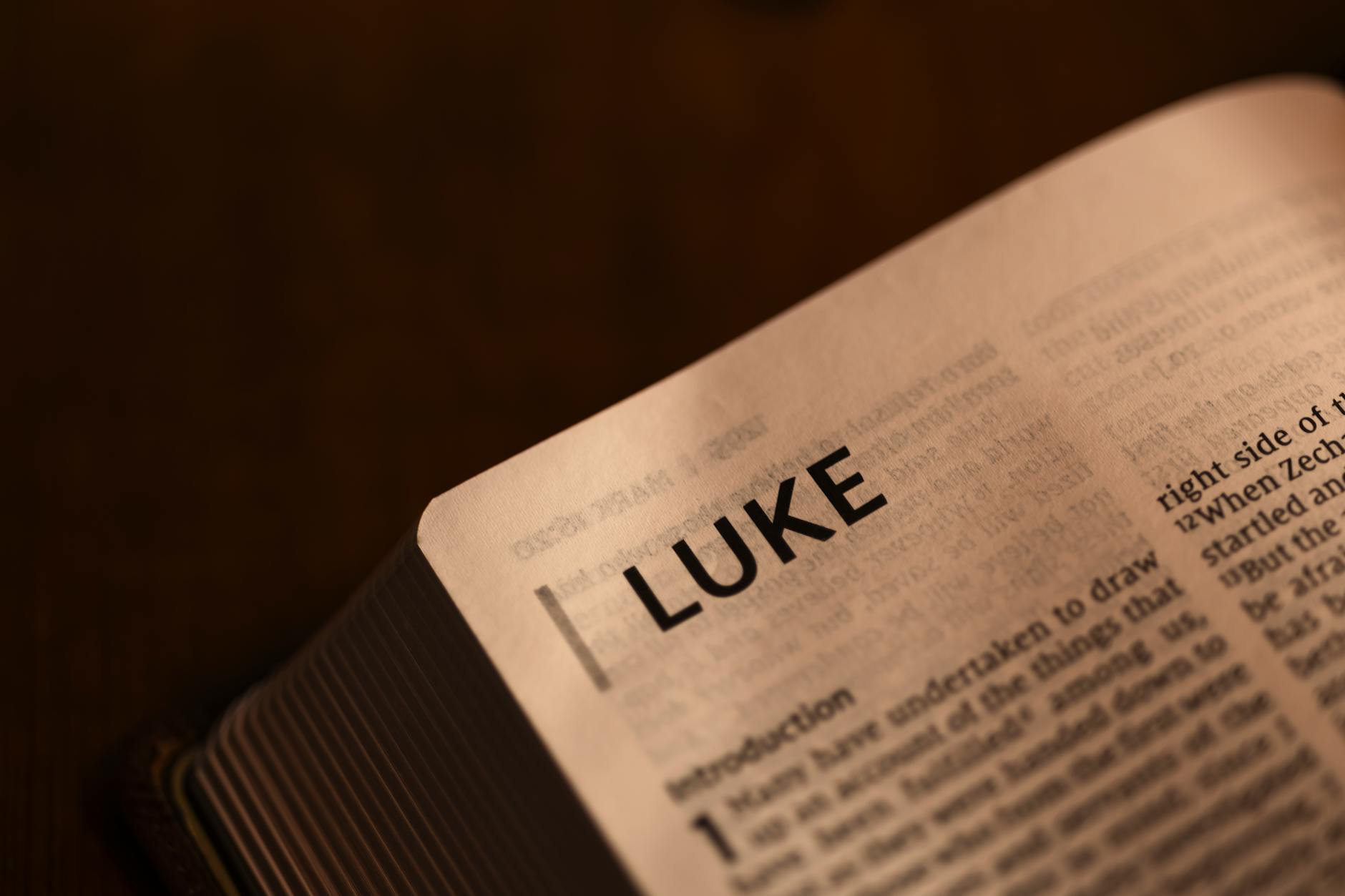 open bible page featuring the book of luke